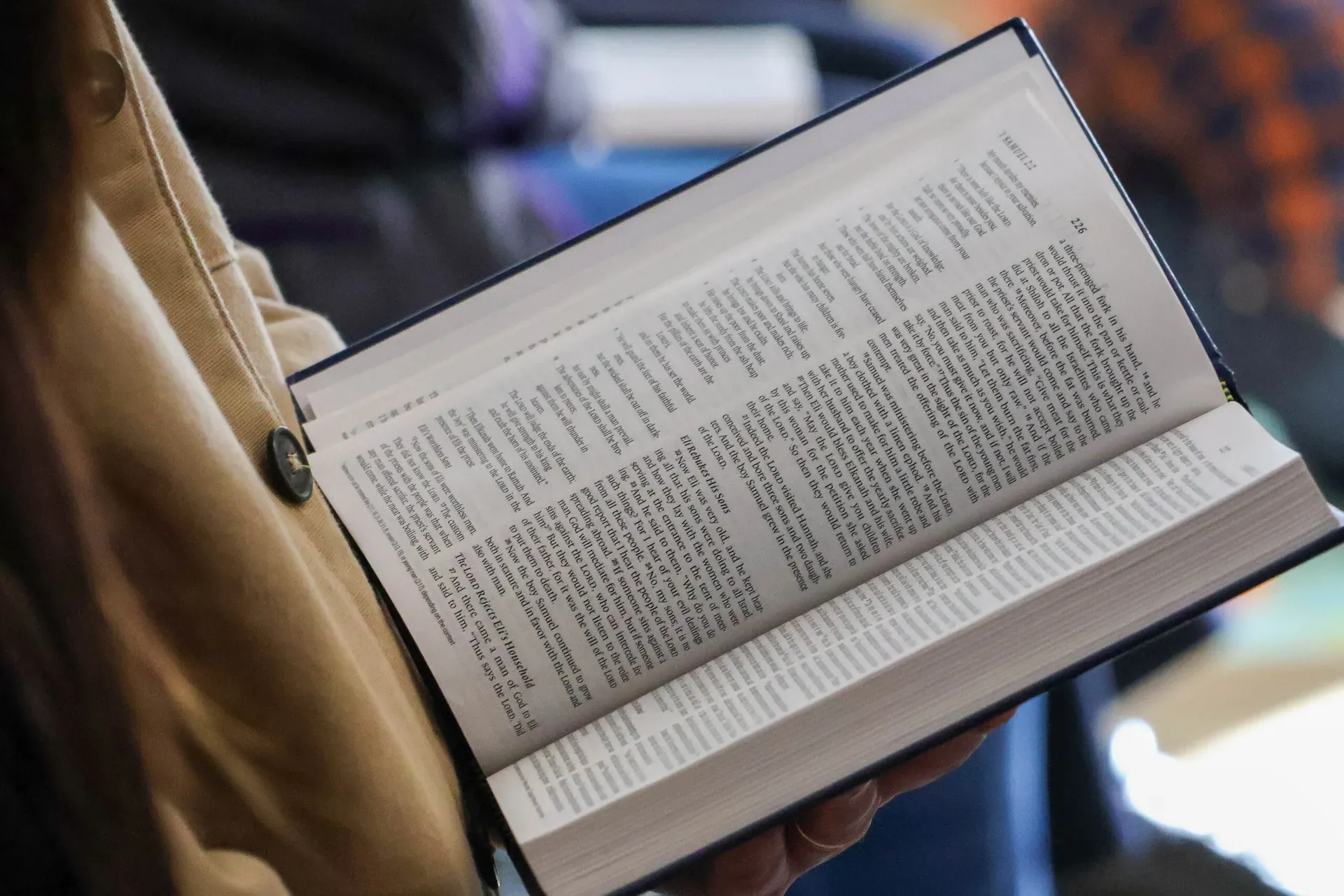 A Bible open at 1 Samuel 2 during a Sunday church service in Clyde