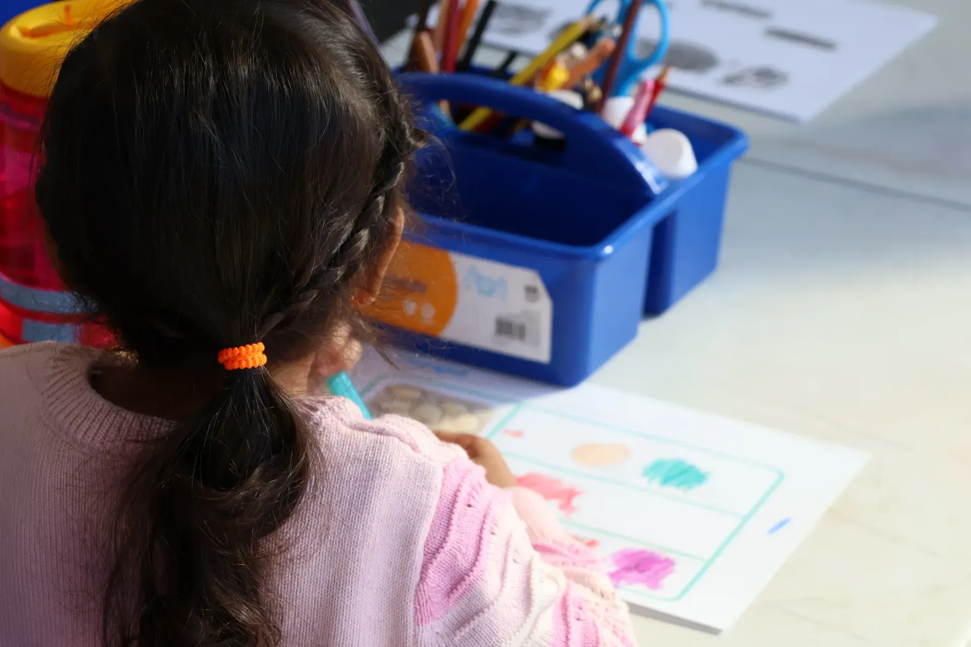 A child drawing during PAC Kids, the kids church at Proclaim in Clyde